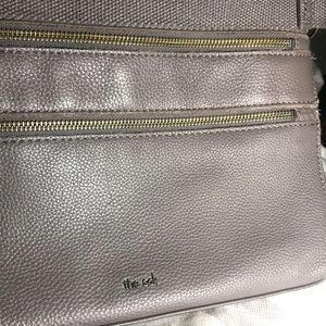 The Sak 4 lrg compartments over shoulder purse